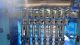 Metica Eight (8) Piston Inline Filling Machine, 500 ML