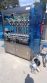Metica Eight (8) Piston Inline Filling Machine, 500 ML