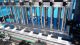 Metica Automatic Filling Line, up to 16 Oz. Bottles