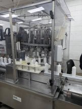 MRM/Elgin 16 Head Rotary Piston Filler, up to 32 Oz.