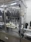 MRM/Elgin 16 Head Rotary Piston Filler, up to 32 Oz.