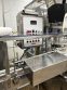 MRM/Elgin 16 Head Rotary Piston Filler, up to 32 Oz.