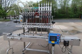 Inline Filling Systems Six Piston Hot Filler, Air Rinser