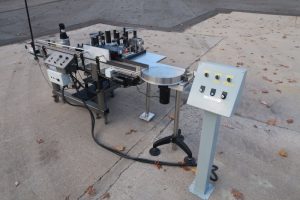 LSI Inline Pressure Sensitive Wrap Labeler, 18 In. Rotary Disc