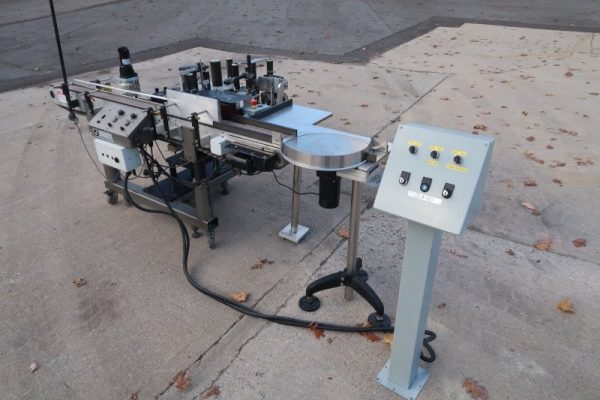 LSI Inline Pressure Sensitive Wrap Labeler, 18 In. Rotary Disc