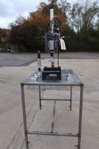Kinex Air Operated Chuck Style Capper with Bench Top Table