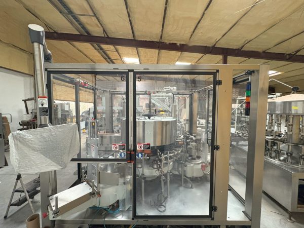 Kosme Nine Station Rotary Front, Back and Neck Cold Glue Labeling System